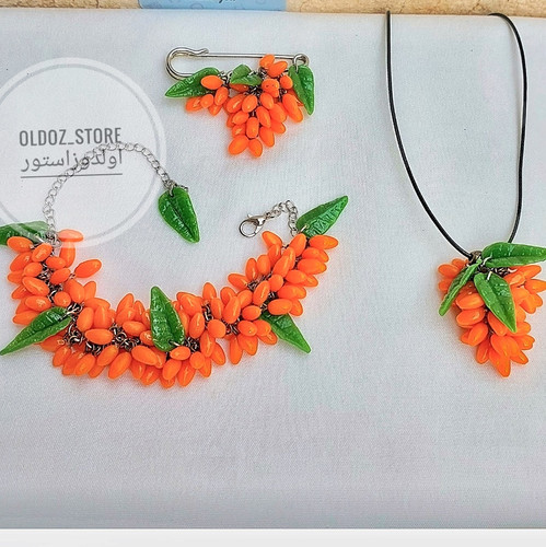 ست گردنبند و دستبند و سنجاق سینه یلدایی میوه سیبکتورن